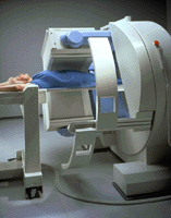 A patient undergoing a nuclear medicine exam of the abdomen